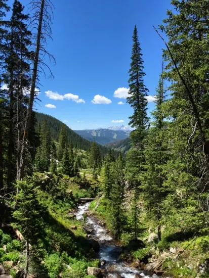 hiking along Booth Creek which is one of the best things to do in vail in summer