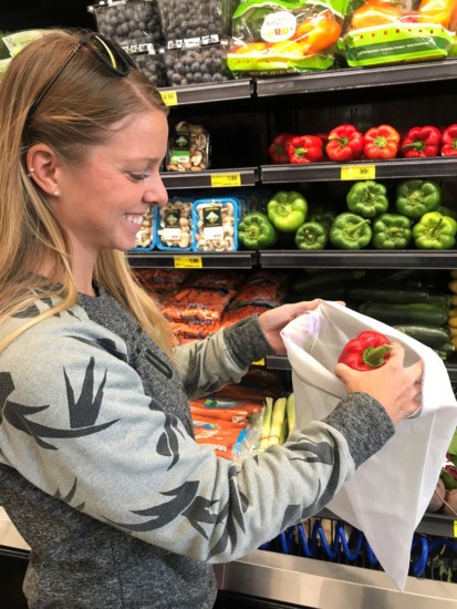 emily shopping for groceries which is a great way to do #vanlife without remote work