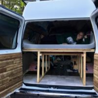 a camper van bed for vanlife