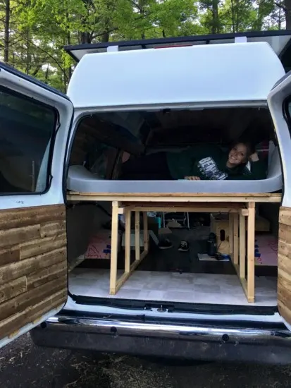 a camper van bed for vanlife