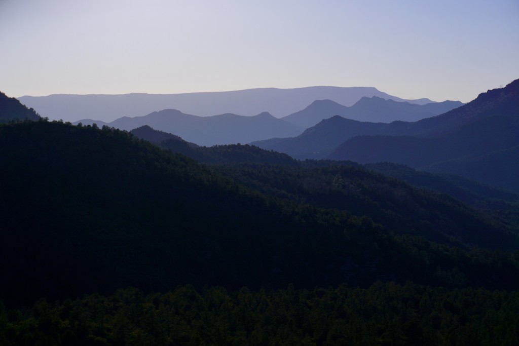 A sunset shows blue mountain layers from Bob Bear Trail.