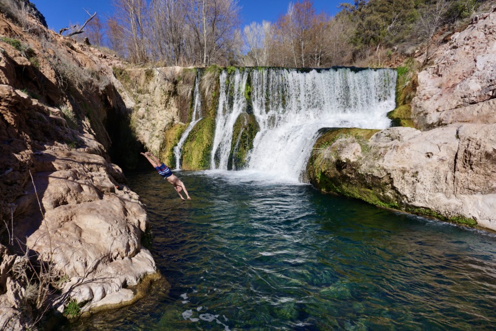 Jake dives into the clear water at Fossil Creek Dam Swimming Hole.