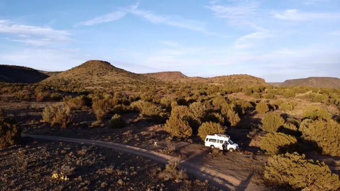 A drone shot of a vanlife campsite in sedona