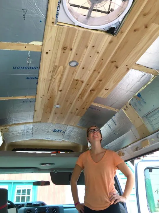 Emily admiring the progress on cedar ceiling installation