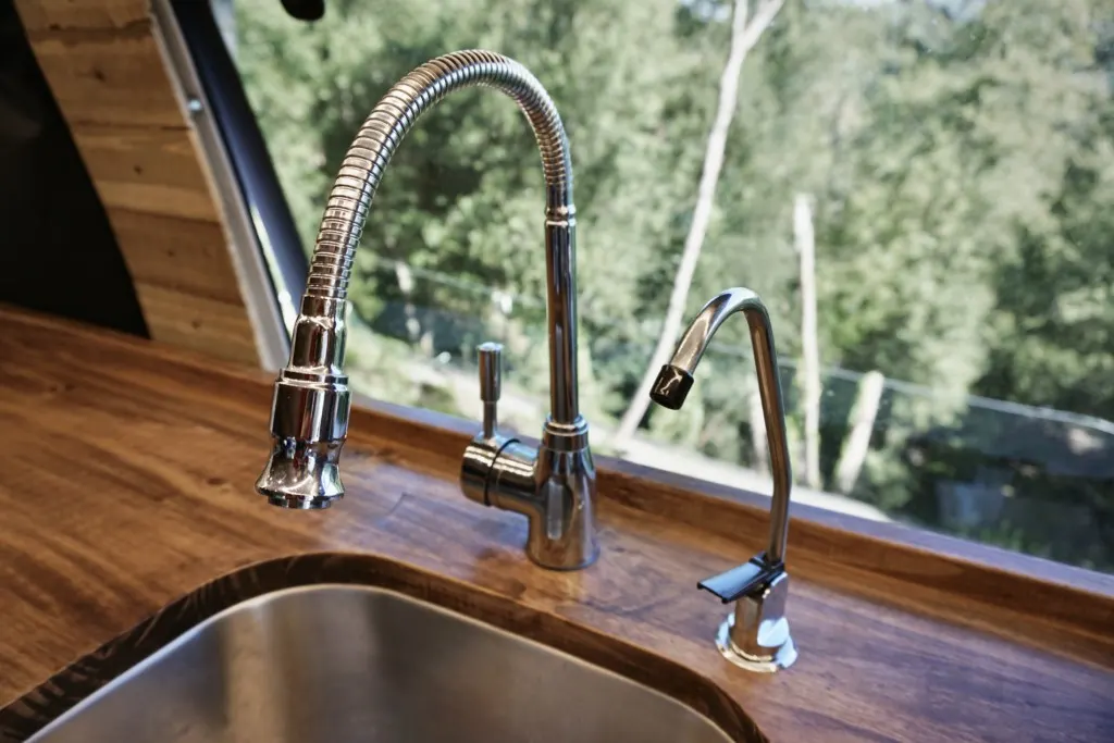 A close up of both water faucets
