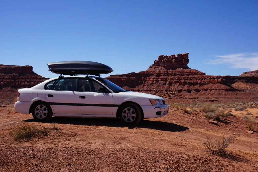 a subaru sedan in the desert