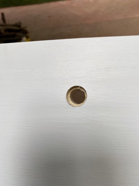The hole in the drawer face for diy rope handle
