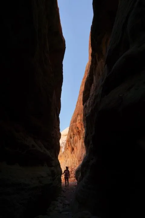 Emily as a silhouette in the slot canyon on White Domes Trail in Valley Of Fire State Park
