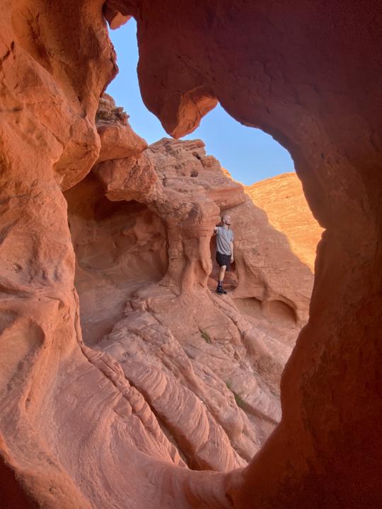 Jake Looking Out From The Wind Caves In Valley Of Fire State Park
