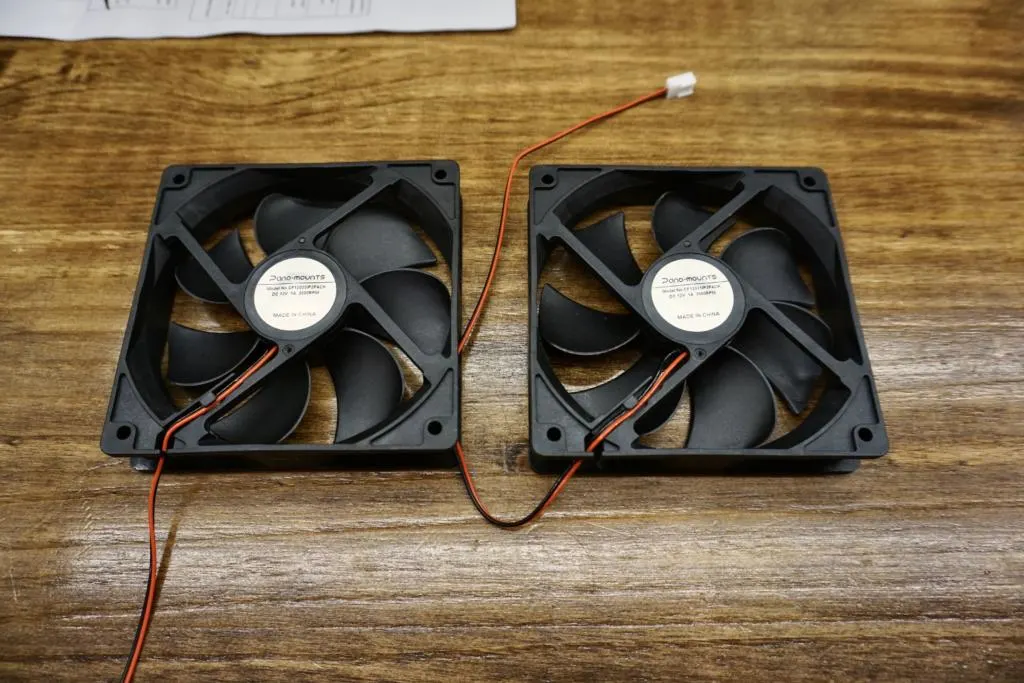 Two computer fans for bed ventilation