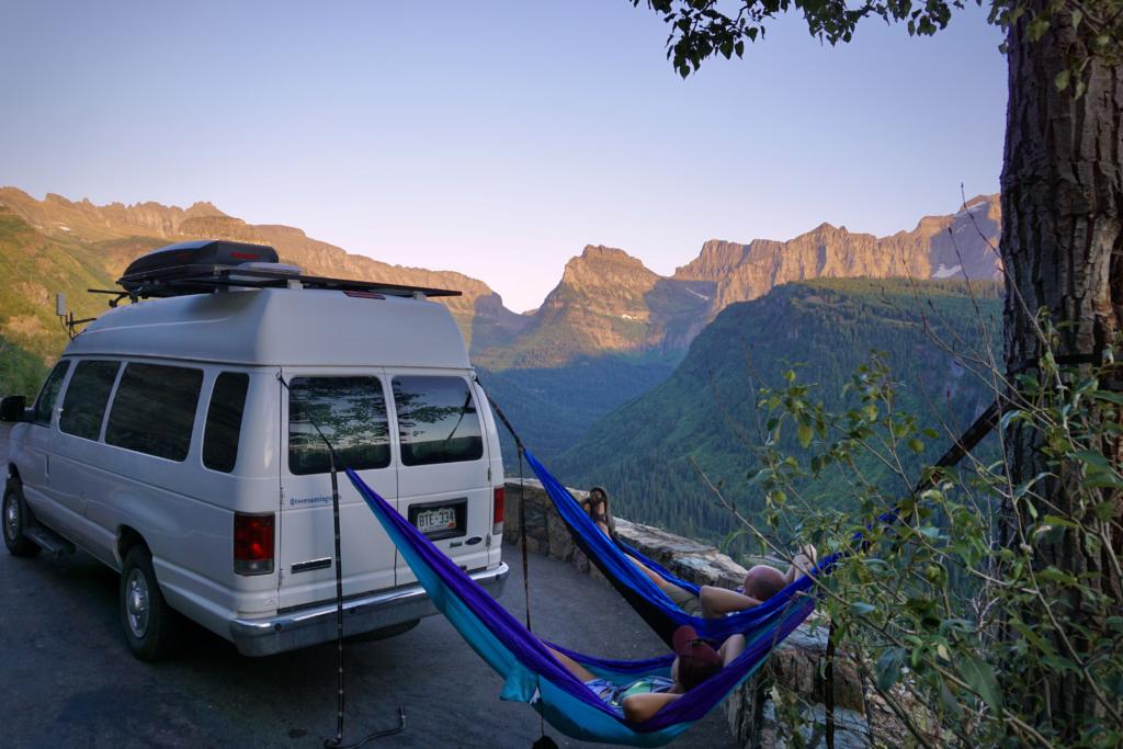 Our Hammocks hanging off the van in Glacier National Park, showing that hammocks are one of the best van life gifts