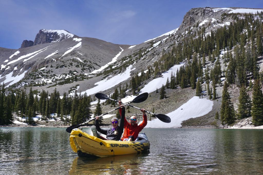 Jake & Emily in a lightweight kayak at an alpine lake in Nevada