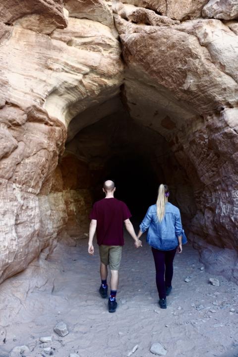 Jake and Emily Holding Hands Walking Through The Belly Of The Dragon: Unique Attractions Near Kanab, UT