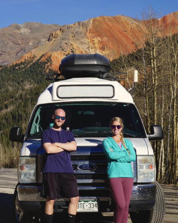Jake and emily posing on the side of the million dollar higway from silverton, co to ouray, co