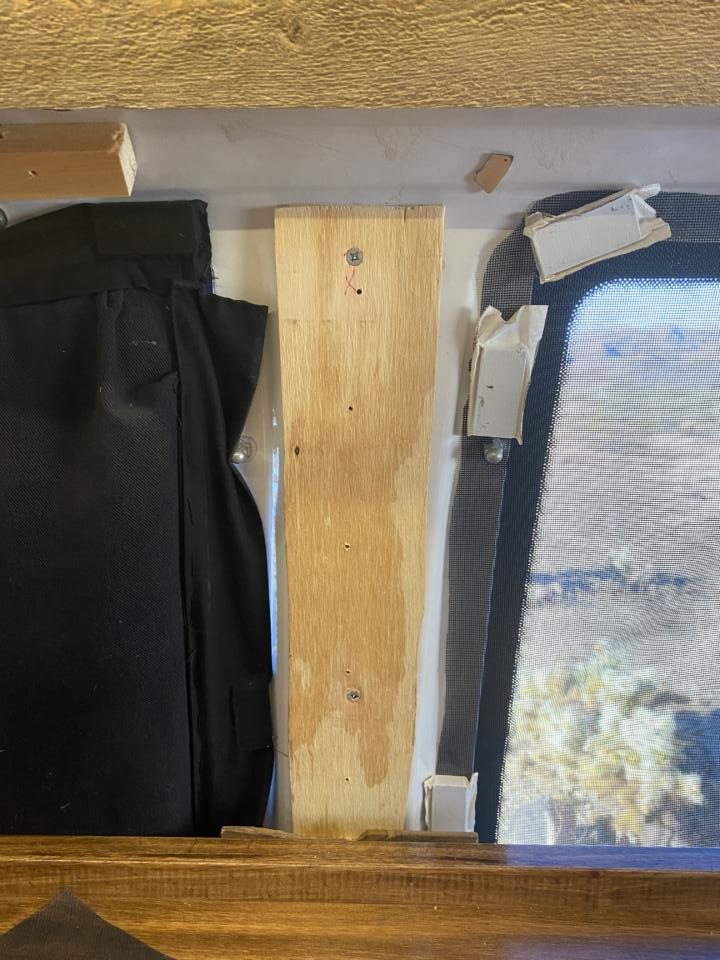 Wood Scraps Between Windows To Help Installing Rustic Wooden Planks To Wall Easier