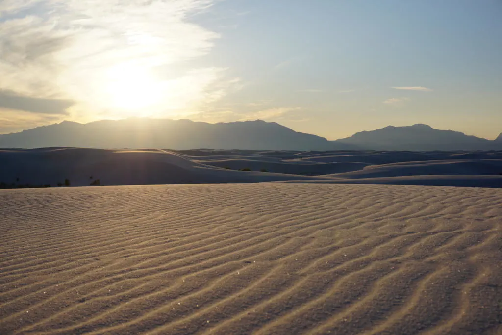 the suns glow at sunrise at White Sands National Park