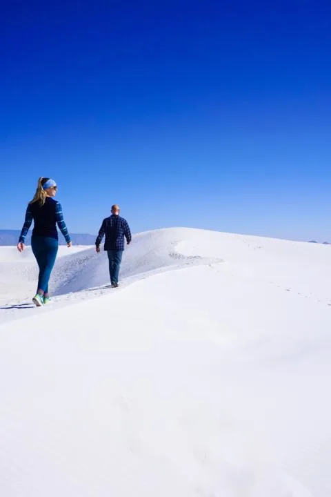 Jake and Emily hiking along Alkali Flats Trail in White Sands National Park