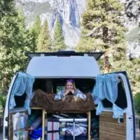 Emily hanging out in our fiberglass hightop van in Yosemite National Park