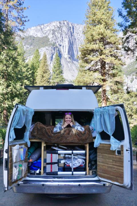 Emily hanging out in our fiberglass hightop van in Yosemite National Park