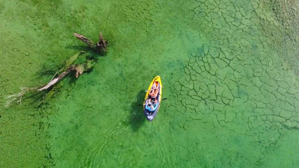 Drone shot of us kayaking in our Intex Explorer, which is one of the best portable kayaks for vanlife