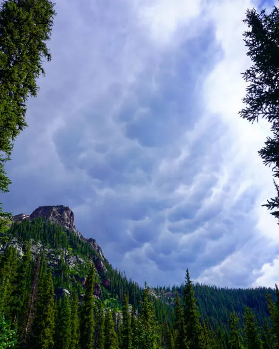 Dramatic storm clouds rolling in over Gore Lake Trail.