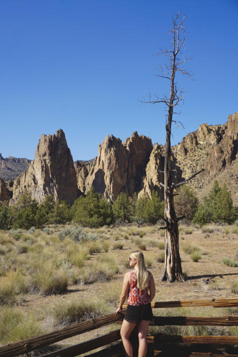 Emily posing at Northern Point Trail At Smith Rock State Park