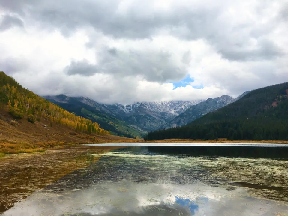 Clouds descend on Piney Lake with fall colors.