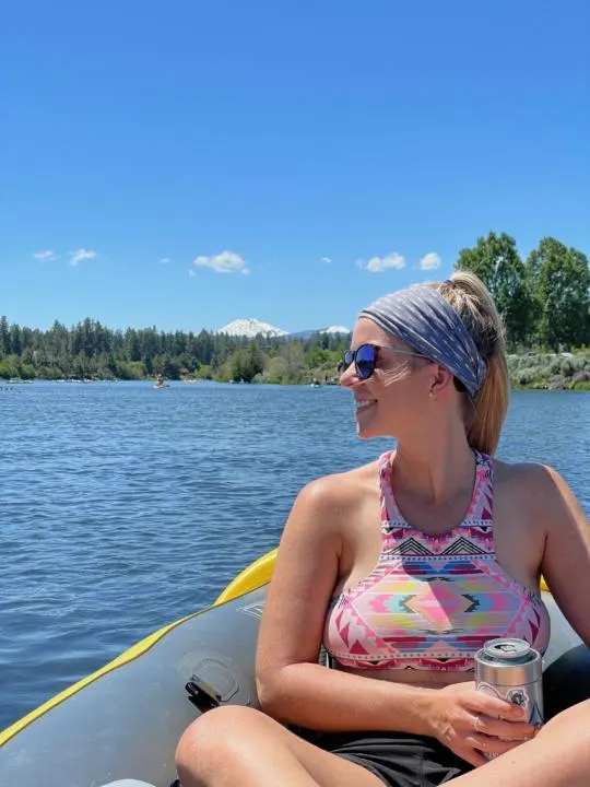 Emily enjoying the view while Floating The Deschutes River with is one of the most epic things to do in Bend, Oregon