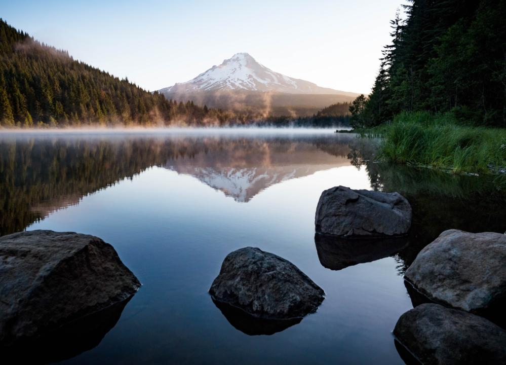 Trillum Lake at dusk with the reflection of Mt. Hood is a must visit stop on an Oregon Road Trip