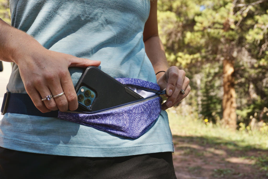 A waist pack is great slim option for carrying things during trail running.