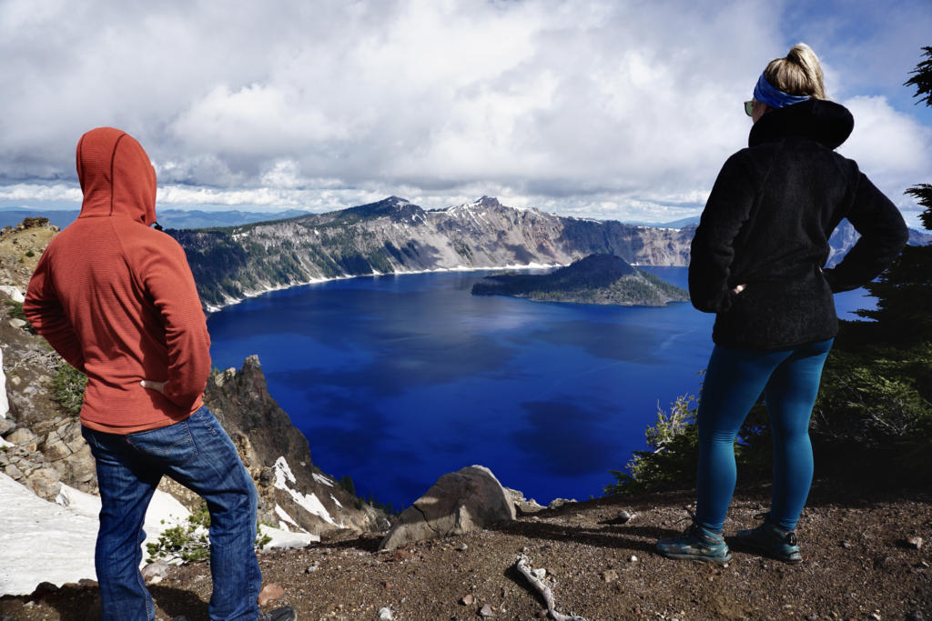 a view from the rim of Crater Lake with us lookin out, which is one of the best stops along an Oregon Road Trip