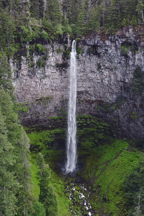Aerial view of Watson Falls which is a great stop along an Oregon road Trip