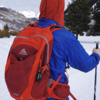 Jake with Sun Company's Outsider 4-in-1 Survival Multi-tool on his backpack