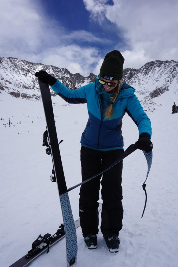 Emily removing her climbing skins that make alpine ski touring possible.