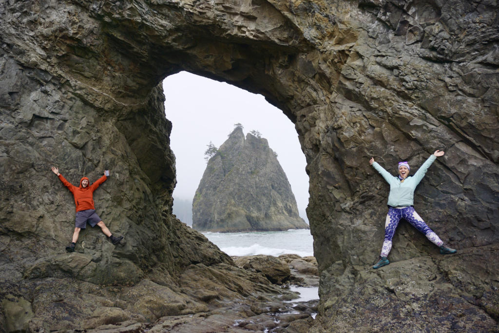 A unique attraction on a Washington Road Trip is Hole In The Wall at Rialto Beach in Olympic National Park