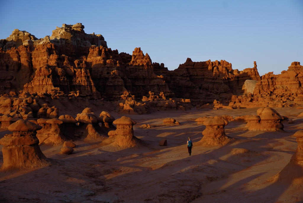 Goblin Valley State Park at sunset with a golden glow