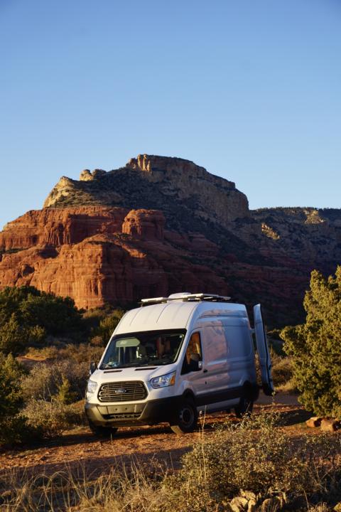 The Ford Transit Cargo High-Roof is a popular campervan choice that you can stand up in.