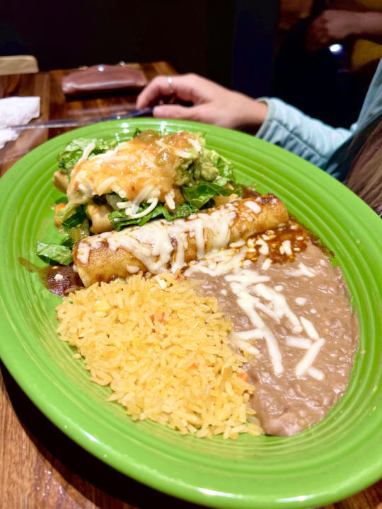 An enchilada and burrito combo plate from The Mexican Bar & Grill.