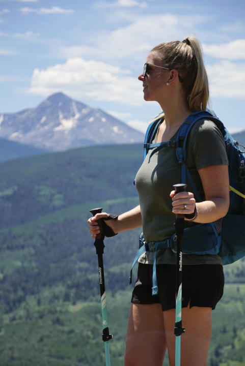 Emily trying out the women's line with her hiking poles for Unbound Merino on a hike