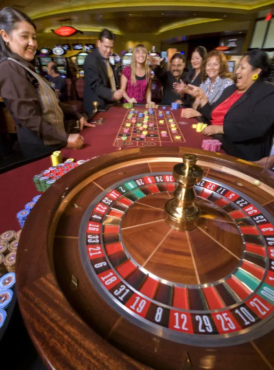 A crowd plays roulette at Sky Ute Casino.