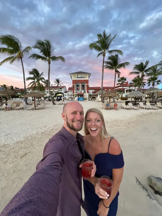 Jake and Emily taking a selfie on the beach at Sandals Grande St. Lucian