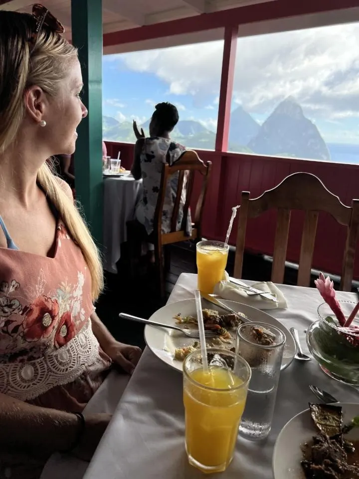 Emily looking at the view from the Beacon Restaurant which is one of the best restaurants in Soufriere