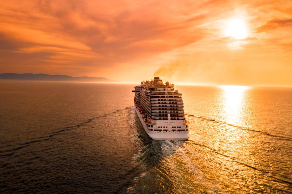 back of cruise ship at sunset, which is a way for Hawaii island hopping