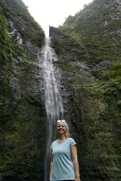 Emily standing under Hanakapi'ai Falls.