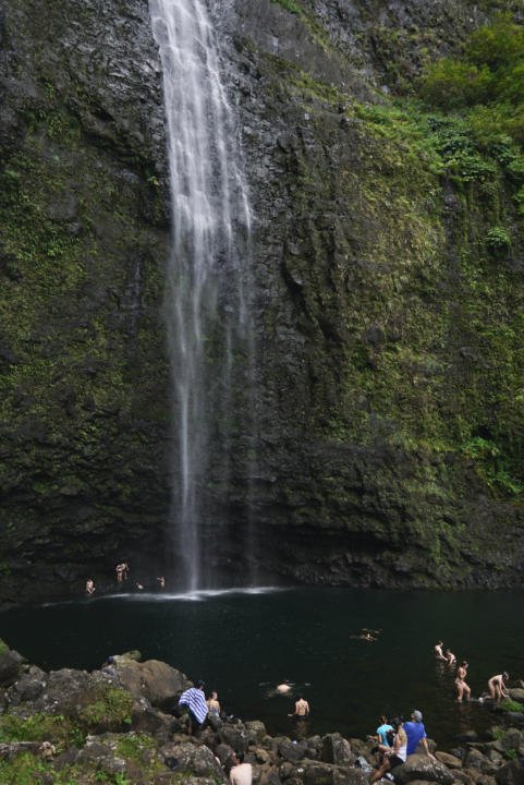 Some people cannot resist swimming directly under the waterfall.