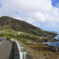 The Kalanianaole Highway in Oahu sees mountains and beautiful coastline.