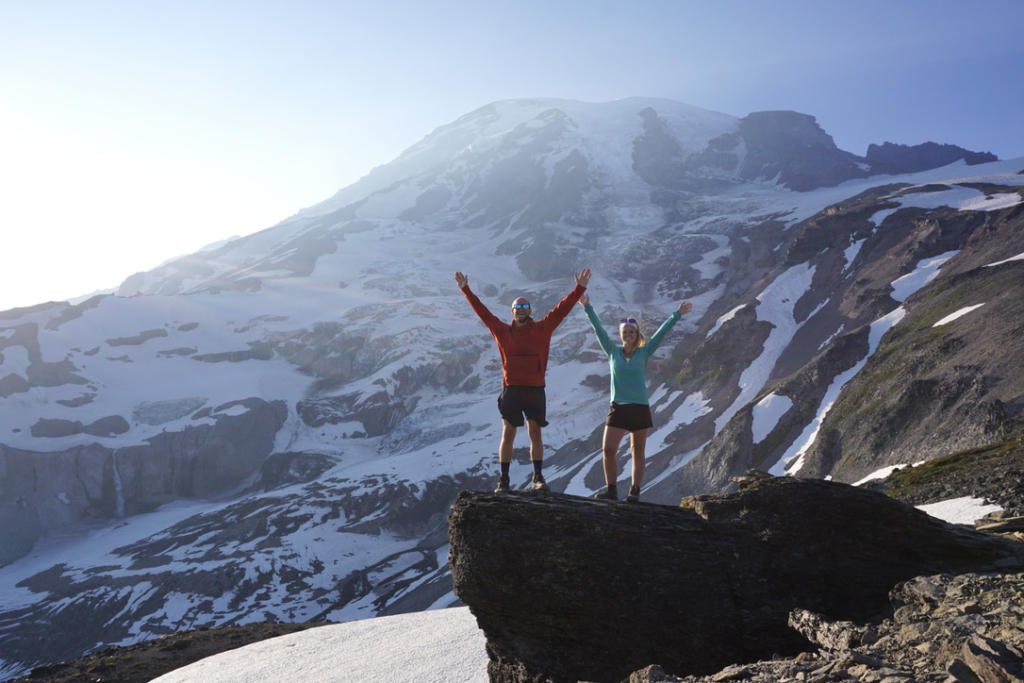 The Two Roaming Souls in front of the massive Mount Rainier.