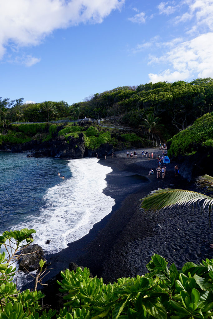 Black Sand Beach at Waianapanapa State Park which is a stop on one the best Maui Tours