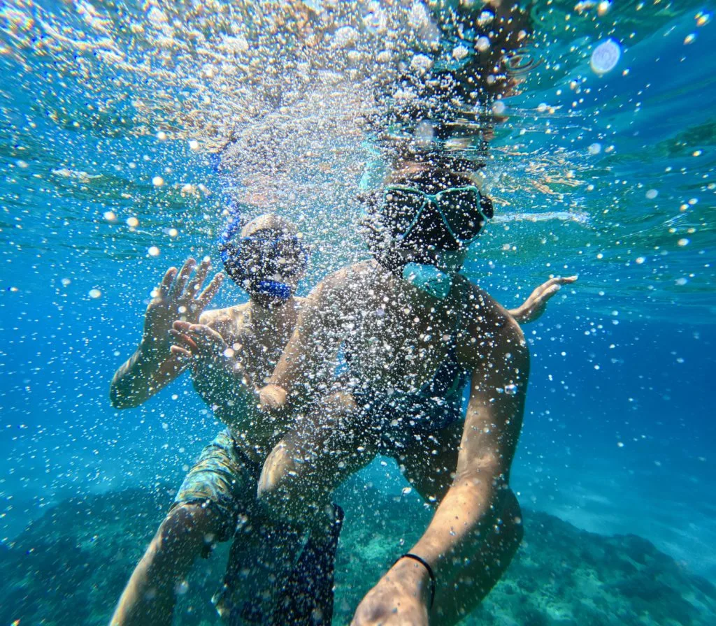 couple snorkeling in Maui which is one of the best Maui tours