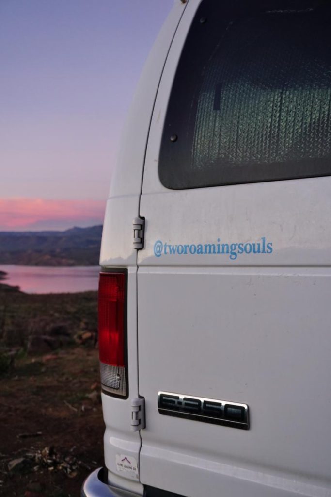Two Roaming Souls Instagram handle on van.